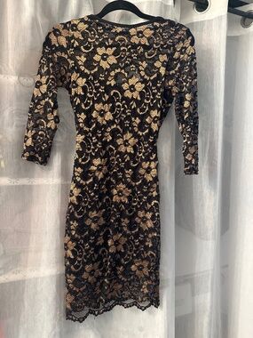 Black and gold lace dress